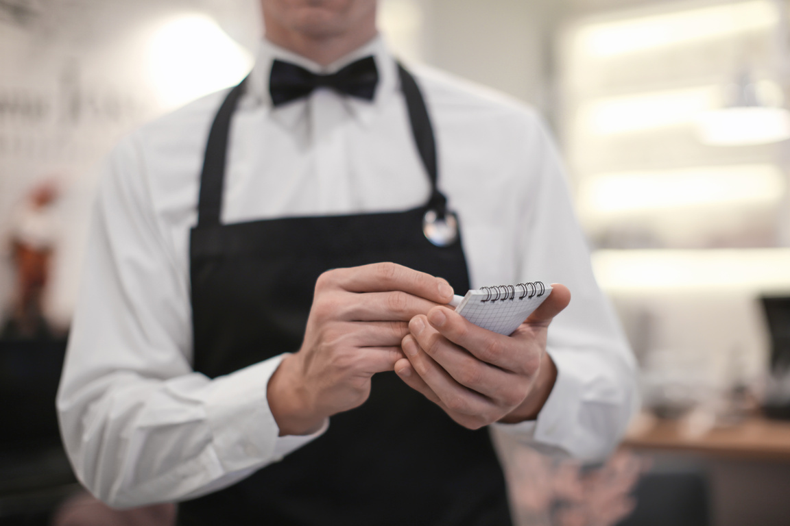 Waiter Taking Order in Restaurant